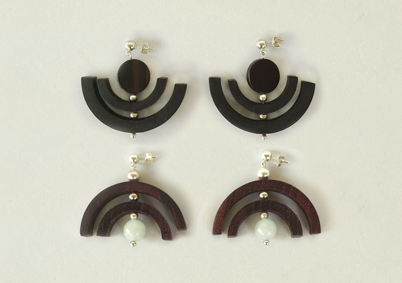 Ebony and rosewood earrings with glass and silver beads by Ena Dubnoff